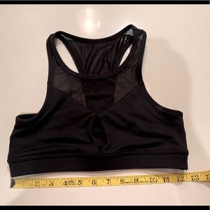 Xinki black strappy bra. Size Medium